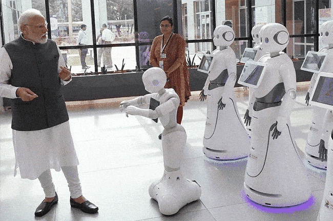 वाइब्रेंट गुजरात में रोबोटों ने स्वागत किया मोदी का