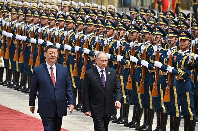 राष्ट्रपति पुतिन बीजिंग में जिनपिंग से मिले